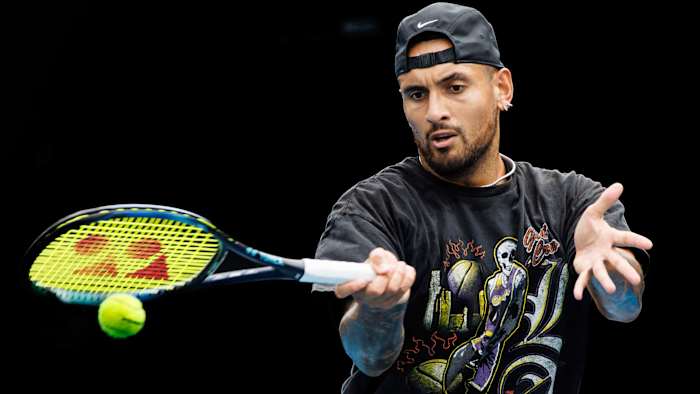 Nick Kyrgios of Australia hits a shot during a practice session on court 16 at Melbourne Park